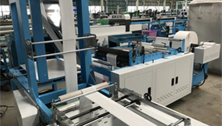 <p>The function of non-woven fabric cross-folding, Bag side sealing , cutting, collection. adjustable photoelectric sensor for printing color mark tracking.</p>
